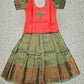 Kids pattu pavadai set with pink semi silk top and green bridal silk skirt by Sri Thulir Tex