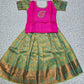 Kids pattu pavadai set with pink semi silk top and green bridal silk skirt by Sri Thulir Tex