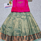 Kids pattu pavadai set with pink semi silk top and green bridal silk skirt by Sri Thulir Tex