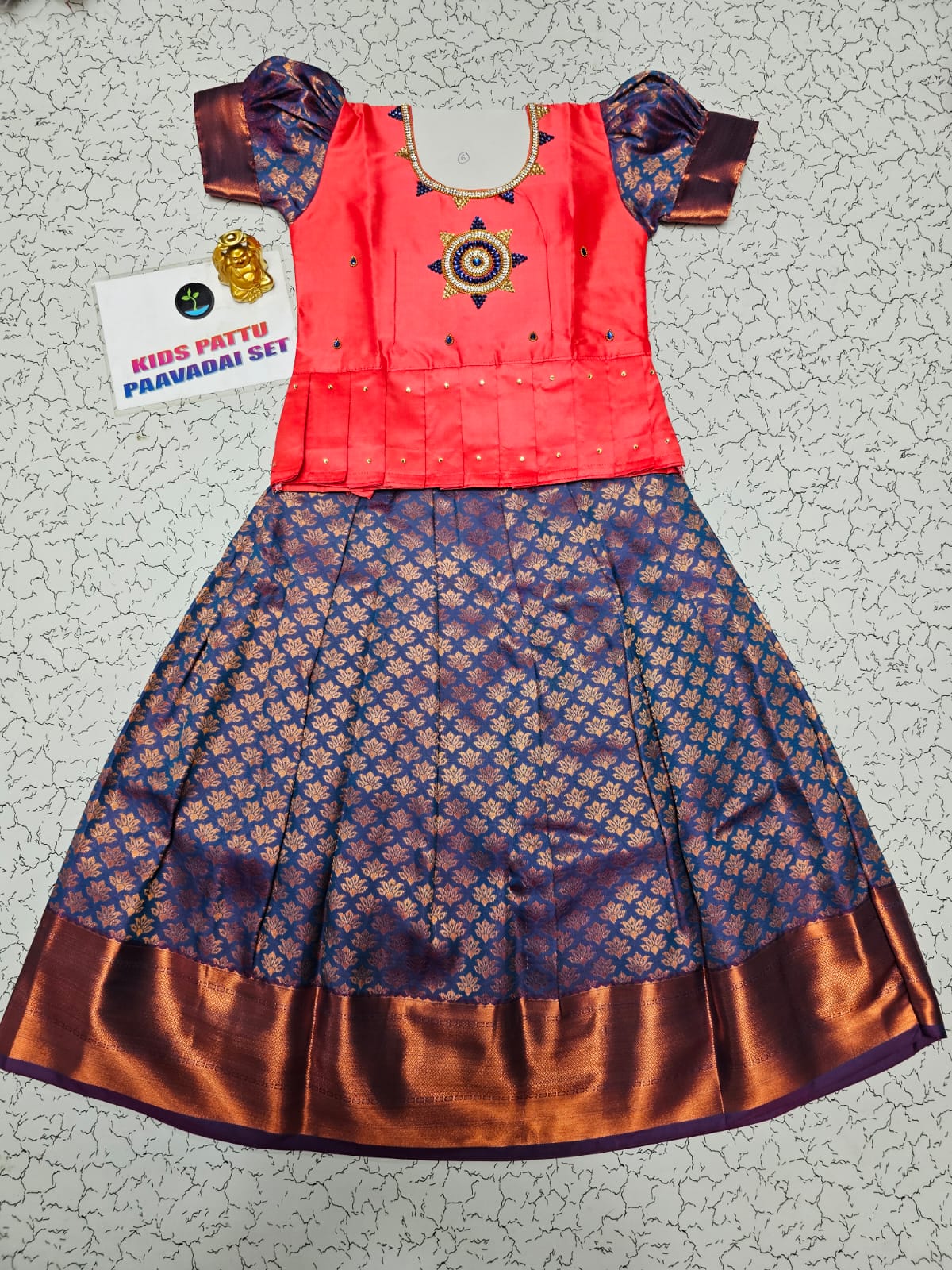 Kids pattu pavadai set with pink semi silk top and navy blue bridal silk skirt by Sri Thulir Tex