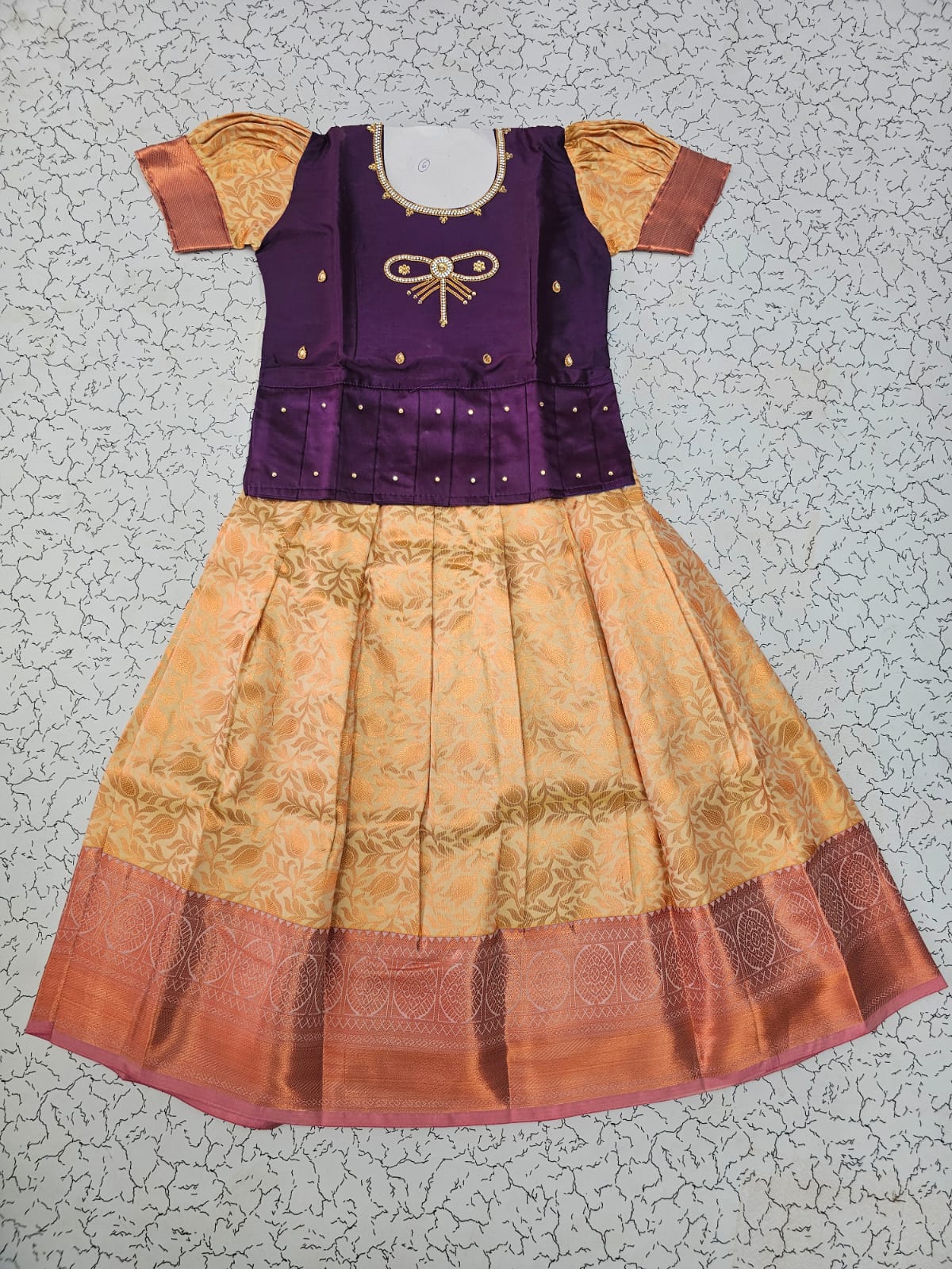 Kids pattu pavadai set with purple semi silk top and cream bridal silk skirt by Sri Thulir Tex