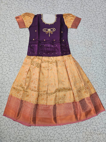 Kids pattu pavadai set with purple semi silk top and cream bridal silk skirt by Sri Thulir Tex