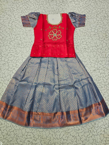 Kids pattu pavadai set with red semi silk top and blue bridal silk skirt by Sri Thulir Tex