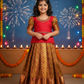 Kids red and gold pattu pavadai set with semi silk blouse and bridal silk skirt by Sri Thulir Tex