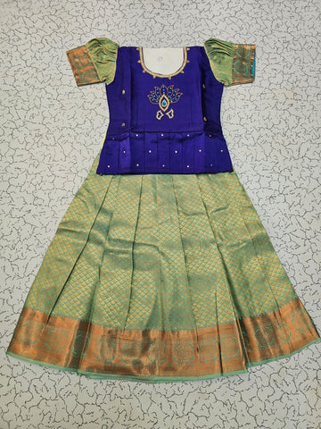 Kids pattu pavadai set with royal blue semi silk top and green bridal silk skirt by Sri Thulir Tex