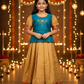 Kids pattu pavadai set with teal blue semi silk top and cream bridal silk skirt by Sri Thulir Tex