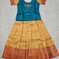Kids pattu pavadai set with teal blue semi silk top and cream bridal silk skirt by Sri Thulir Tex