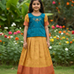 Kids pattu pavadai set with teal blue semi silk top and cream bridal silk skirt by Sri Thulir Tex