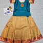 Kids teal blue stone work blouse with gold silk pattu pavadai set by Sri Thulir Tex