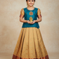 Kids teal blue stone work blouse with gold silk pattu pavadai set by Sri Thulir Tex