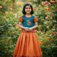 Kids teal blue and orange pattu pavadai set with puff sleeve blouse and zari silk skirt from Sri Thulir Tex