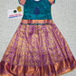Kids teal green and purple-gold pattu pavadai set with puff sleeves and zari woven skirt from Sri Thulir Tex