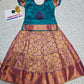Kids teal green and purple pattu pavadai set with puff sleeve blouse and zari woven skirt from Sri Thulir Tex