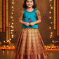 Kids pattu pavadai set with teal green top and purple bridal silk skirt from Sri Thulir Tex
