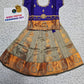 Kids Pattu Pavadai set with violet stone-work top and beige zari woven skirt from Sri Thulir Tex.