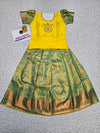 Kids Yellow and Green Pattu Pavadai Set with Semi Silk Top and Bridal Silk Skirt – Traditional South Indian Dress