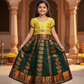 Kids Pattu Pavadai set with yellow stone-work top and dark green zari woven skirt from Sri Thulir Tex.