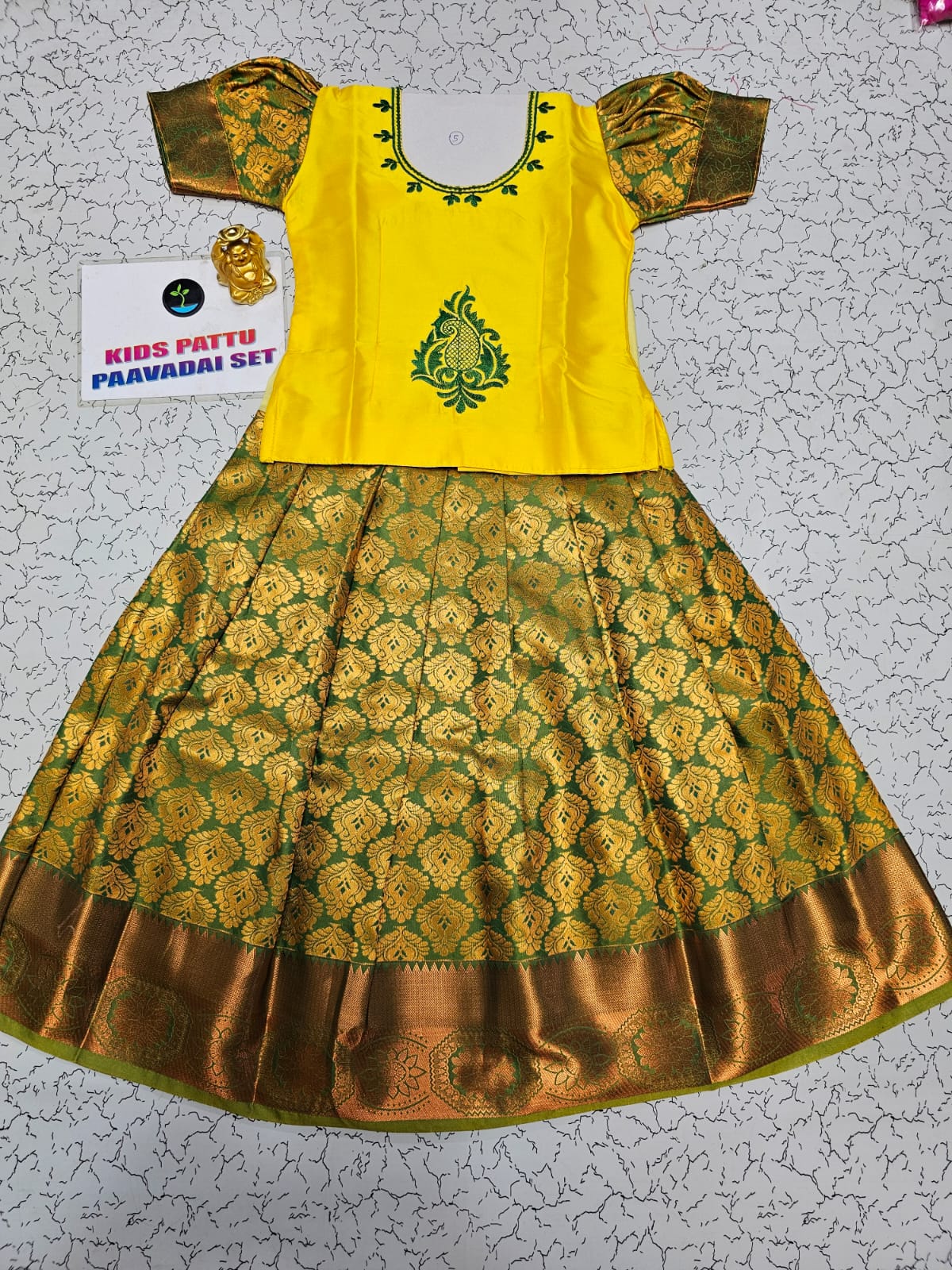 Kids yellow semi silk top with green bridal silk zari skirt – Pattu Pavadai Set – Sri Thulir Tex