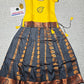 Kids Pattu Pavadai set with yellow stone-work top and grey zari woven skirt from Sri Thulir Tex.
