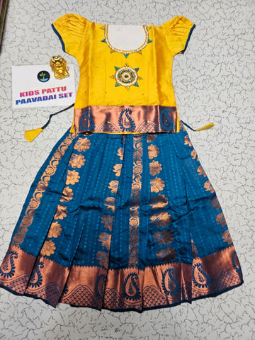 Kids pattu pavadai with yellow top and peacock blue emboss skirt – Sri Thulir Tex