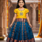 Kids pattu pavadai with yellow top and peacock blue emboss skirt – Sri Thulir Tex