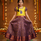 Kids pattu pavadai set with yellow semi-silk top and purple leaf patterned silk skirt by Sri Thulir Tex