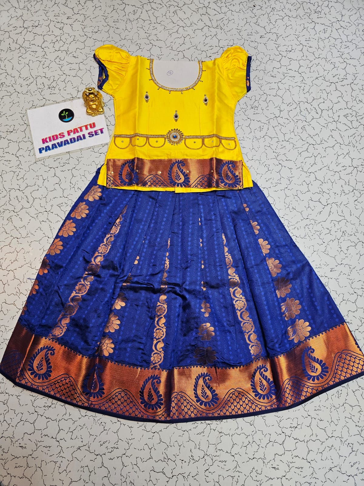 Kids pattu pavadai with yellow top and royal blue emboss skirt – Sri Thulir Tex
