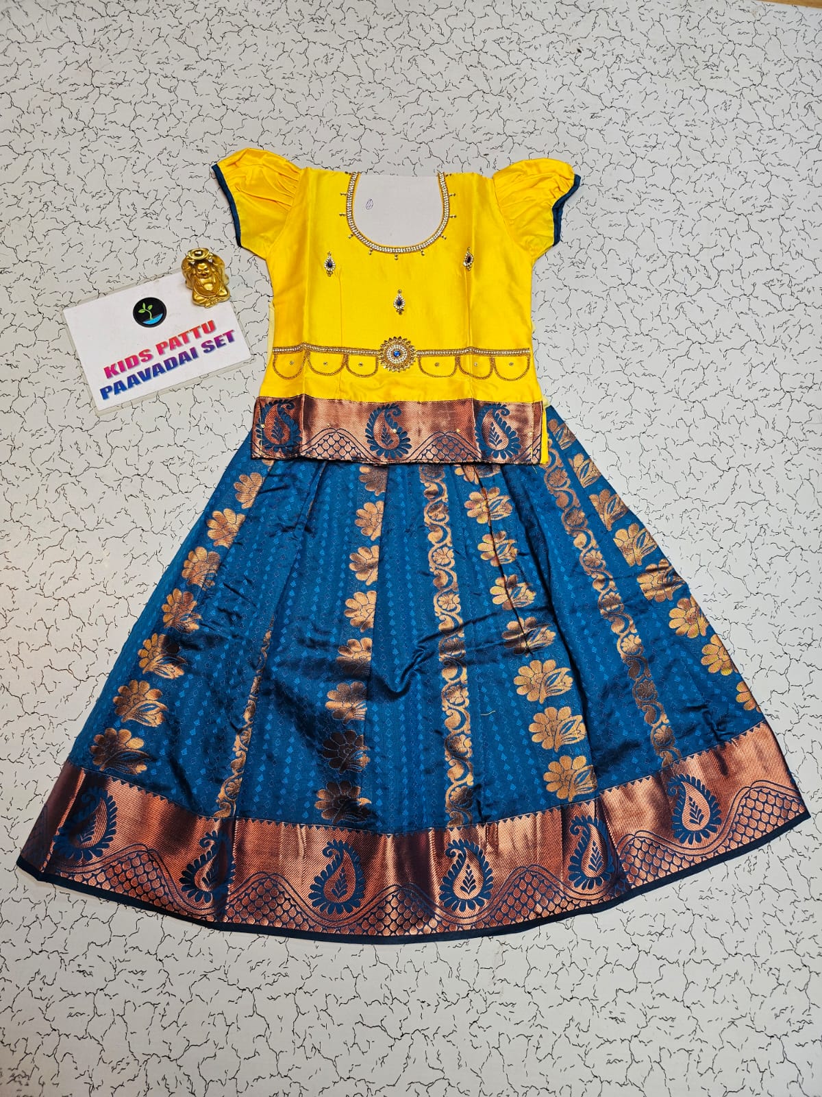 Kids pattu pavadai with yellow top and royal blue emboss skirt – Sri Thulir Tex