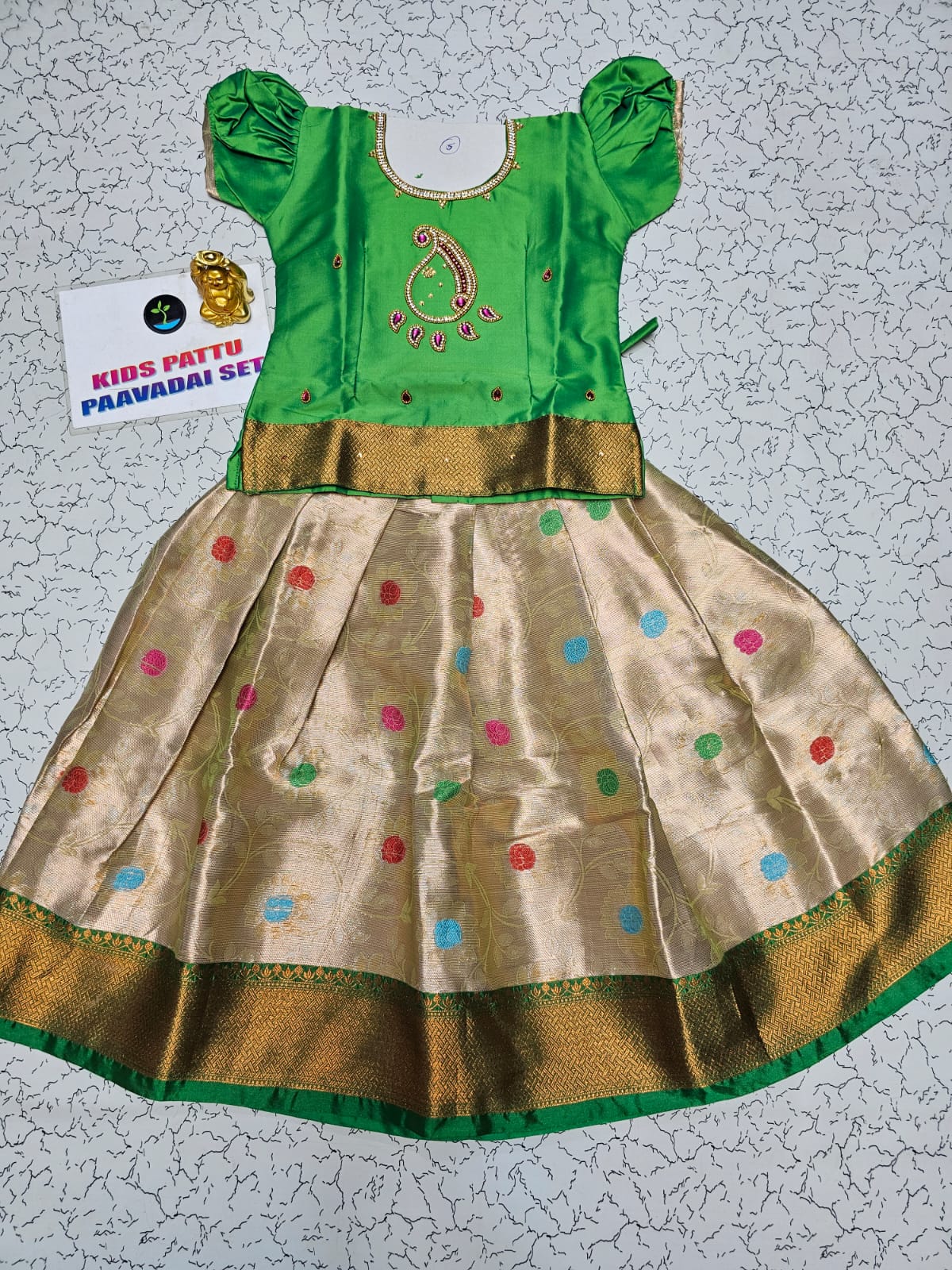 Light green and golden Banarasi semi silk pattu pavadai for girls with puff sleeve and zari border – Sri Thulir Tex