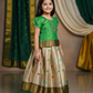 Light green and golden Banarasi semi silk pattu pavadai for girls with puff sleeve and zari border – Sri Thulir Tex