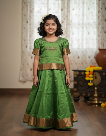 Light green semi silk pattu pavadai for girls with puff sleeves and gold zari border – Sri Thulir Tex