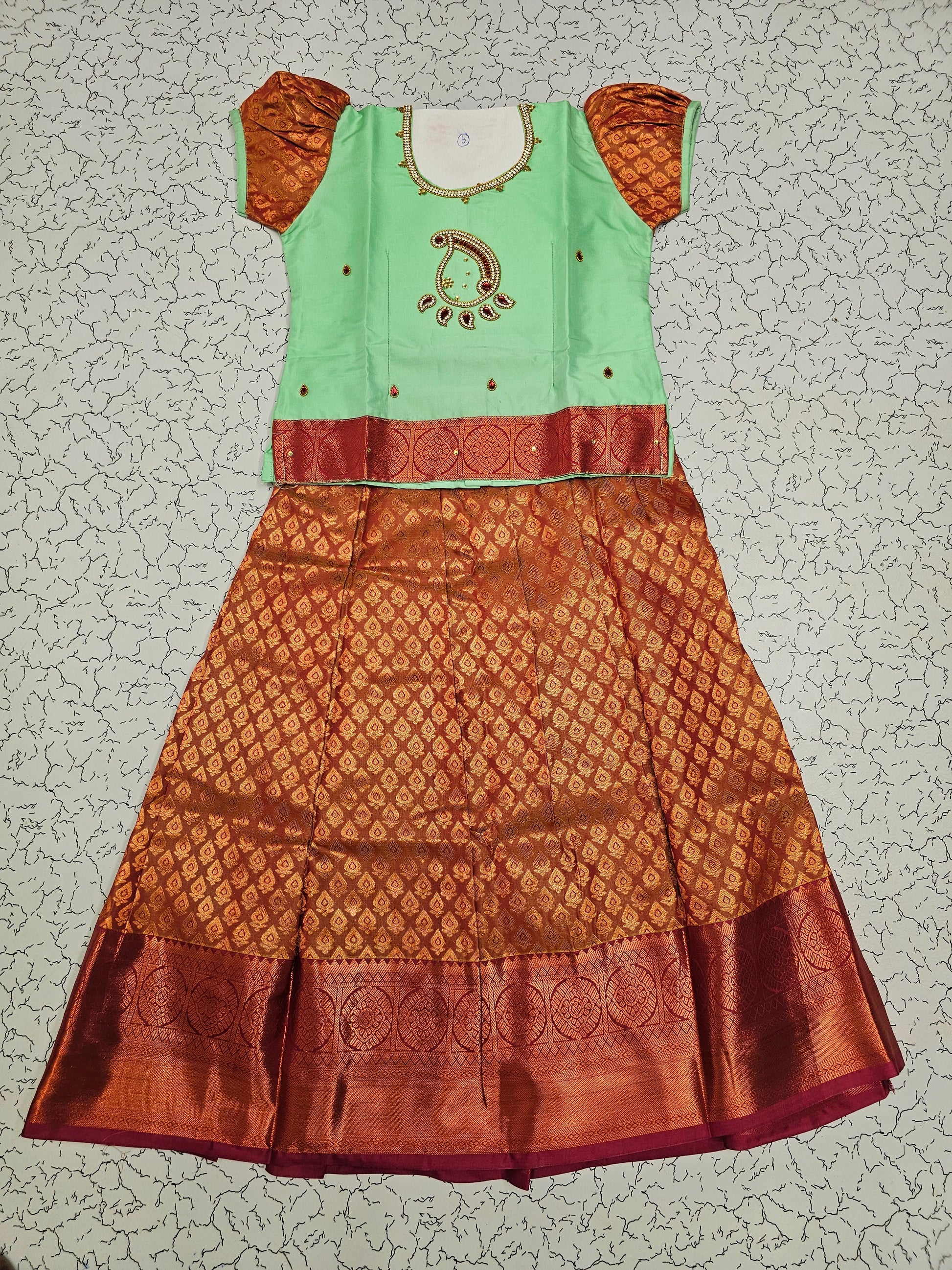 Mint green and copper bridal silk pattu pavadai for kids with puff sleeves and stone work design – Sri Thulir Tex South Indian traditional wear
