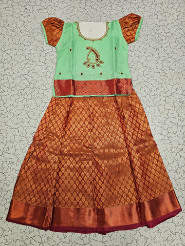 Mint green and maroon silk pattu pavadai for kids with puff sleeves and stone work neckline – Sri Thulir Tex traditional South Indian wear