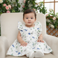 White muslin baby frock with cartoon dinosaur print and butterfly sleeves front open design – Sri Thulir Tex