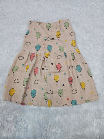 Cream muslin baby jabla frock with colorful balloon print and front open button design – Sri Thulir Tex