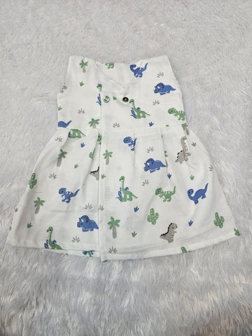 White muslin baby jabla frock with cute dinosaur print and front open button style – Sri Thulir TexWhite muslin baby jabla frock with cute dinosaur print and front open button style – Sri Thulir Tex