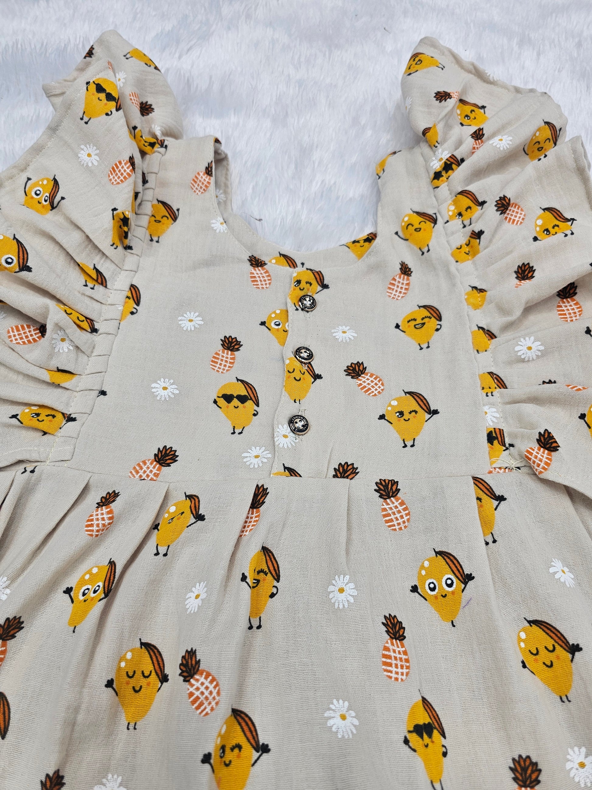 Cream muslin baby jabla frock with pineapple print and butterfly sleeves front open design – Sri Thulir Tex