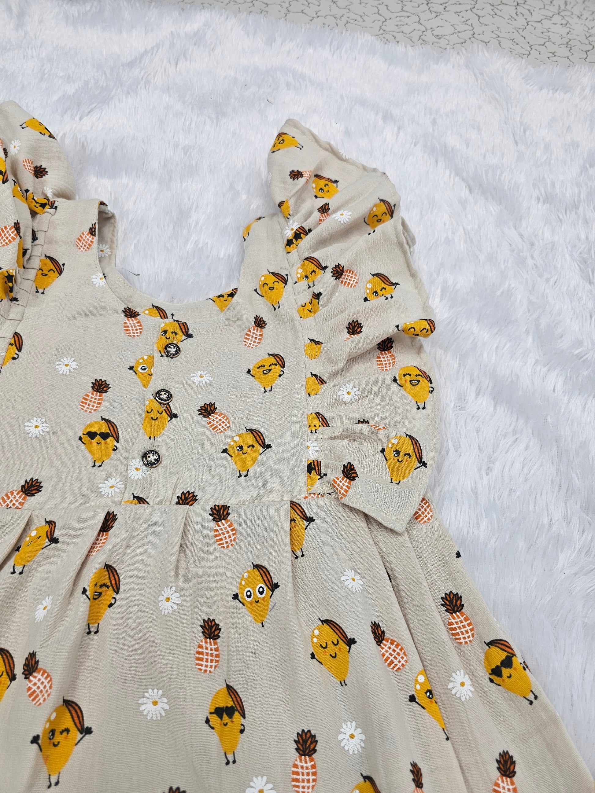 Cream muslin baby jabla frock with pineapple print and butterfly sleeves front open design – Sri Thulir Tex