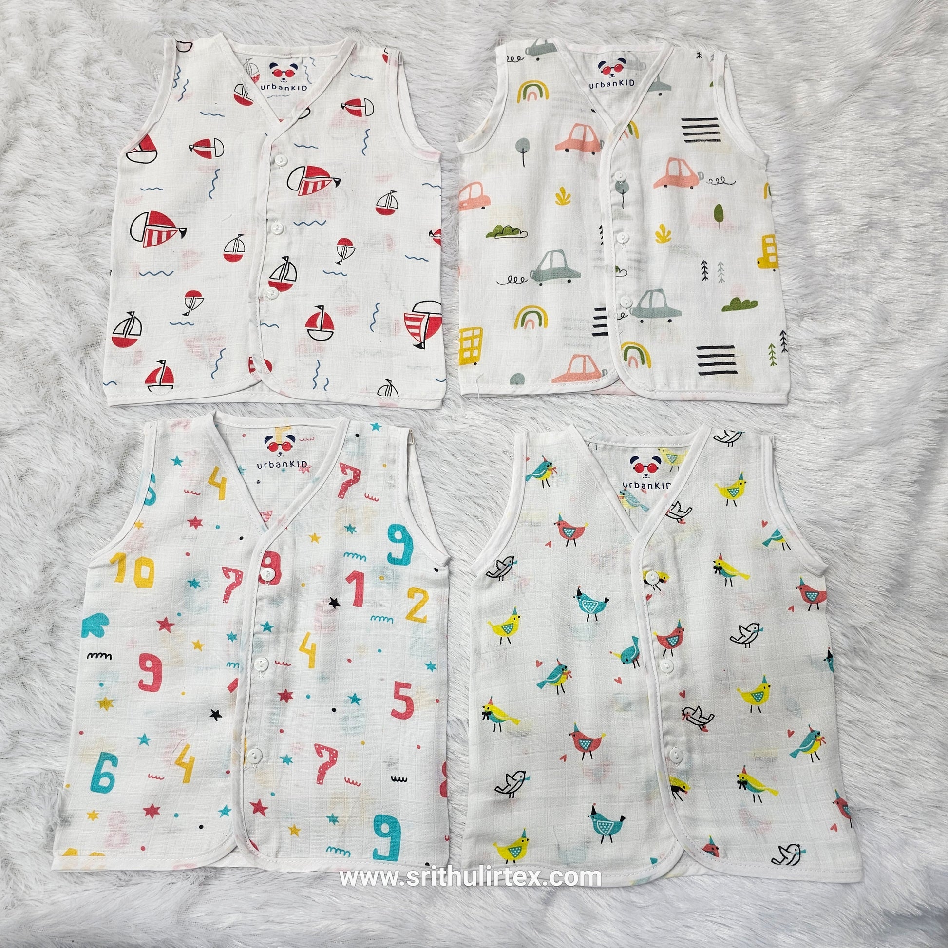 New born baby button jabla set in soft white cotton with multi printed designs – pack of 4 by Sri Thulir Tex