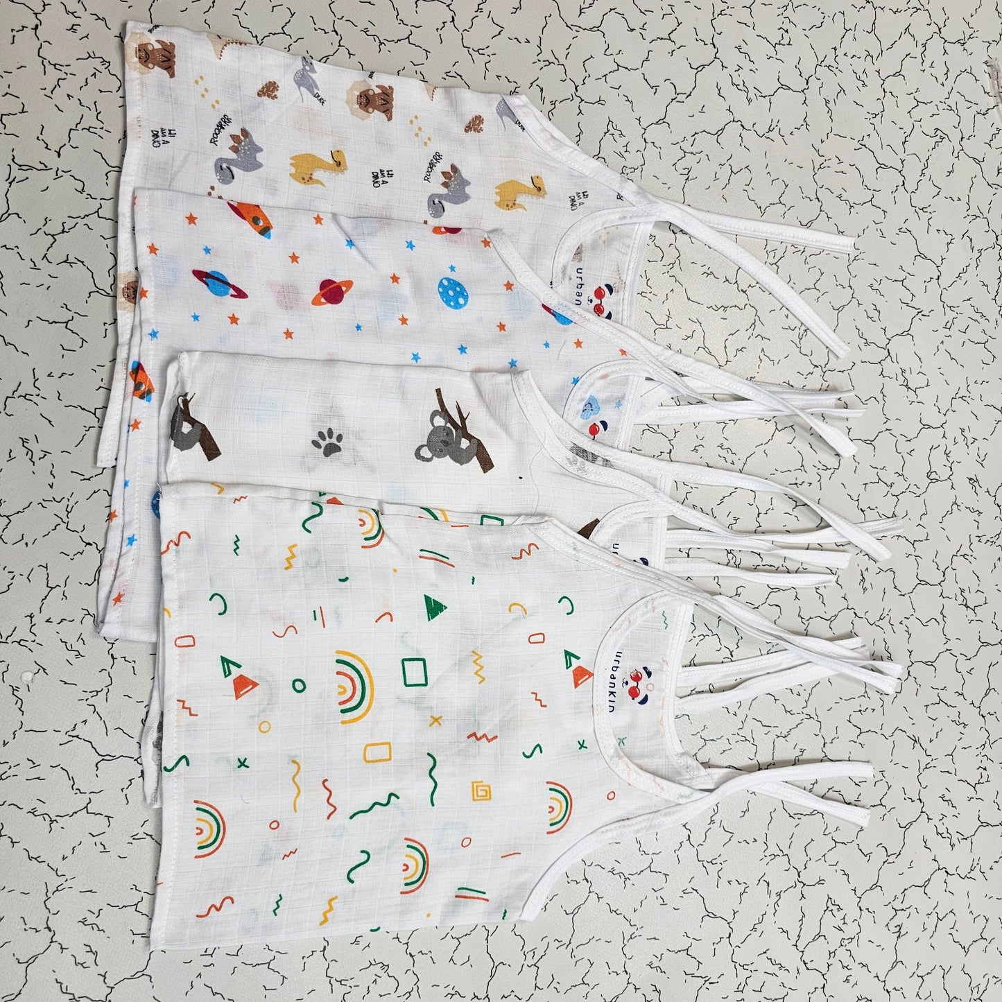 Newborn baby rope type jabla set in white muslin with multi printed designs – pack of 4 by Sri Thulir Tex