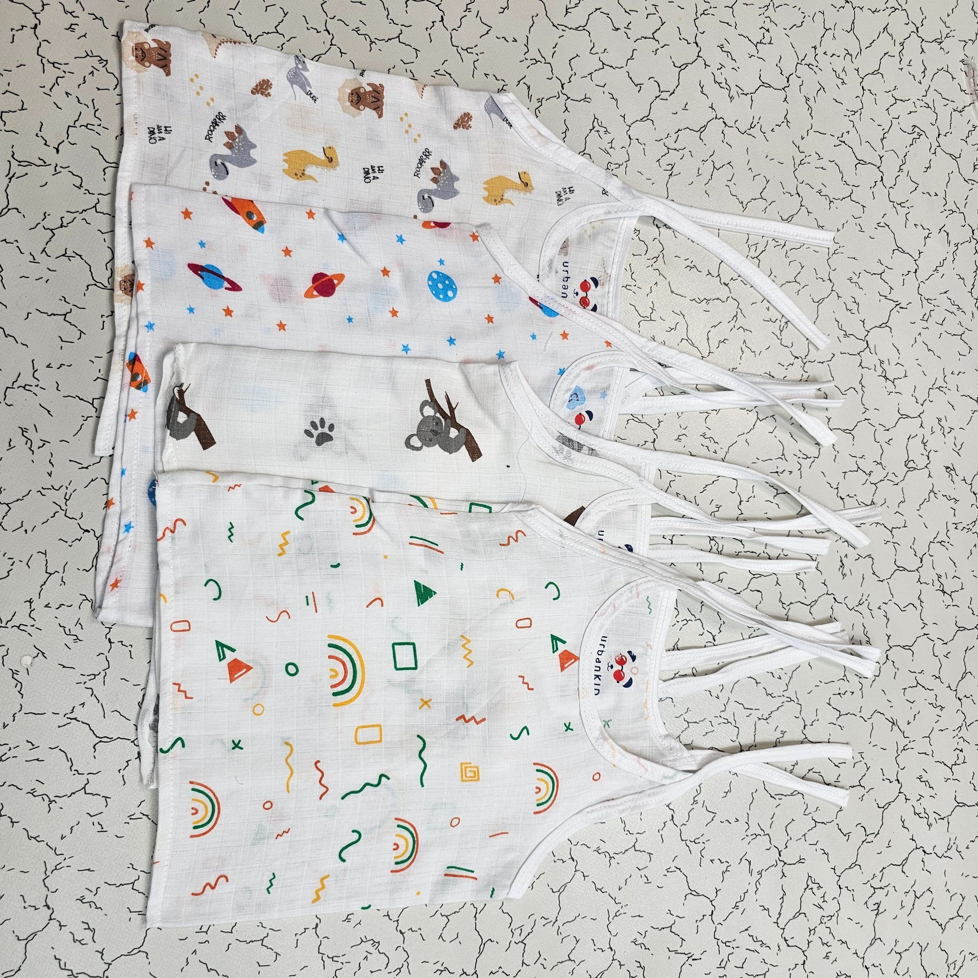 Newborn baby rope type jabla set in white muslin with multi printed designs – pack of 4 by Sri Thulir Tex