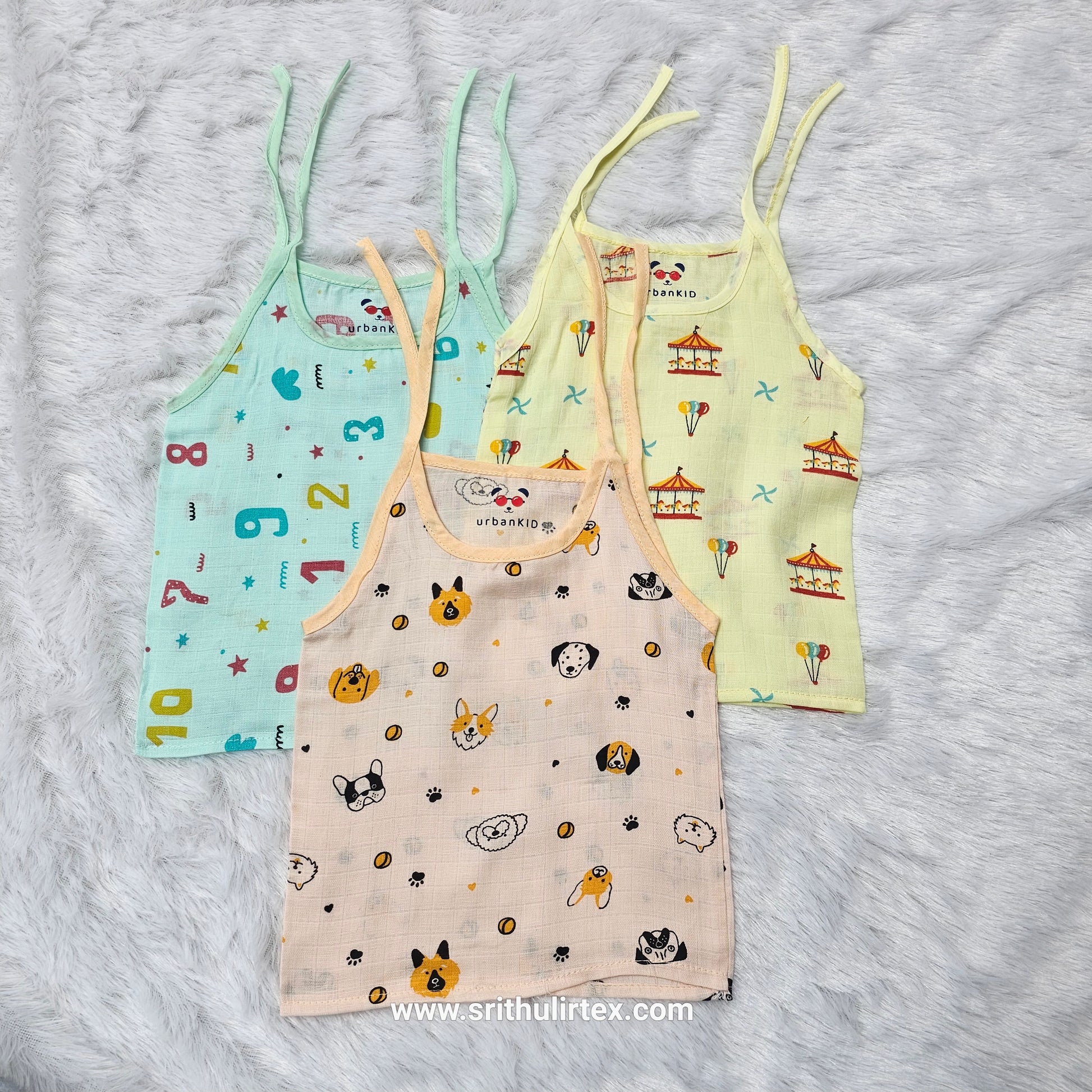 Pack of 3 newborn muslin rope type jabla tops in yellow, peach, and blue with multi printed designs.