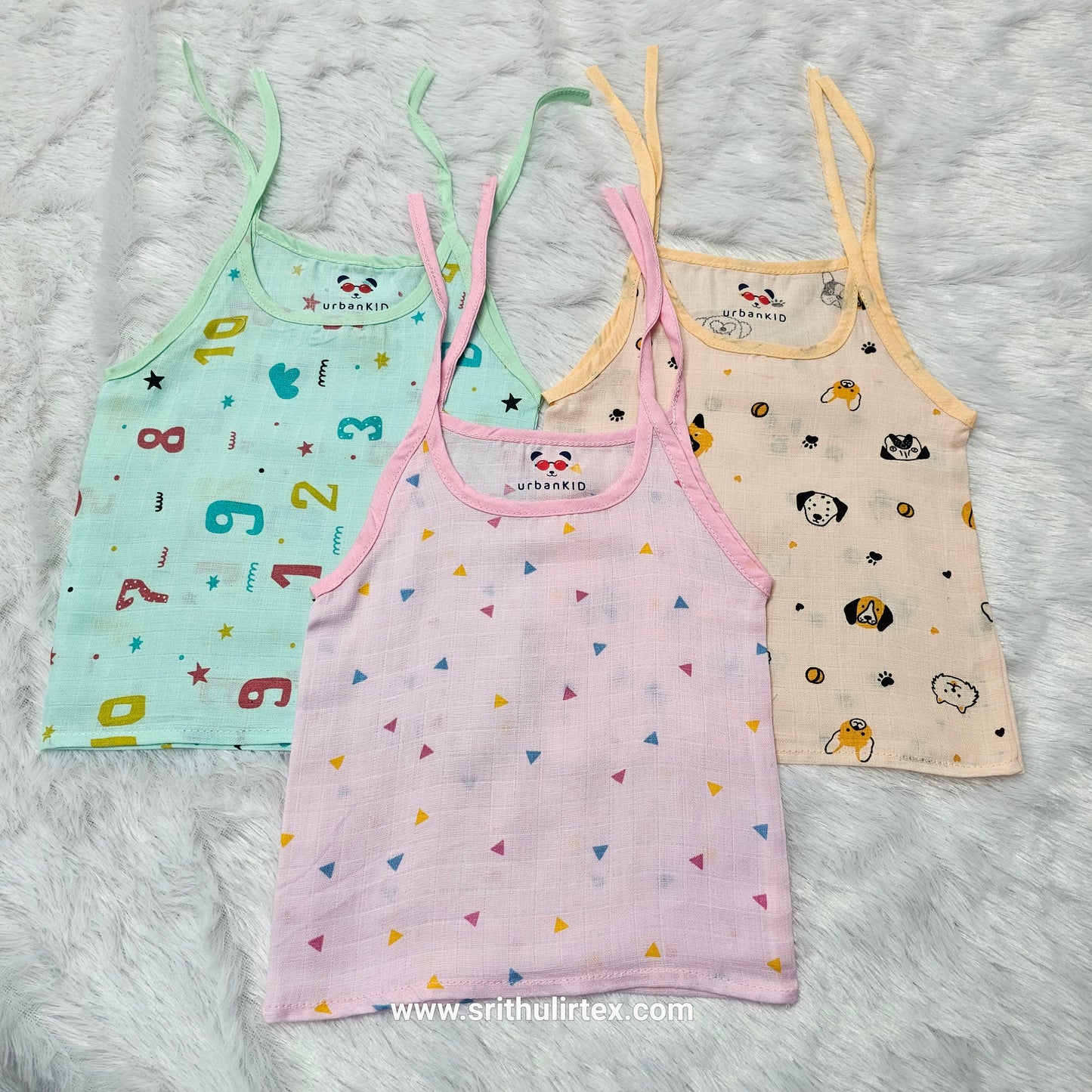 Pack of 3 newborn muslin rope type jabla tops in yellow, peach, and blue with multi printed designs.