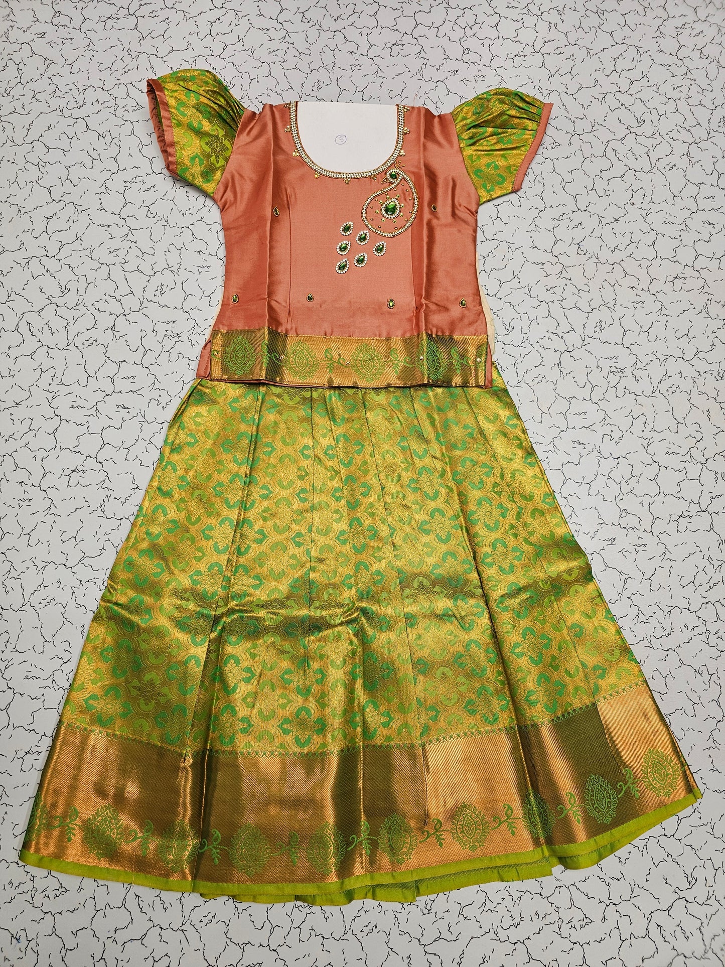 Peach and green silk pattu pavadai for girls with stone embroidery blouse and zari bridal silk skirt – Sri Thulir Tex