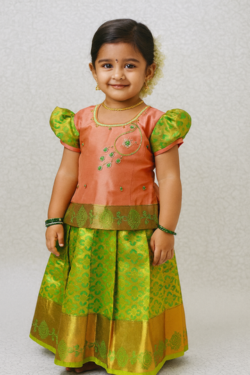 Peach and green silk pattu pavadai for girls with stone embroidery blouse and zari bridal silk skirt – Sri Thulir Tex