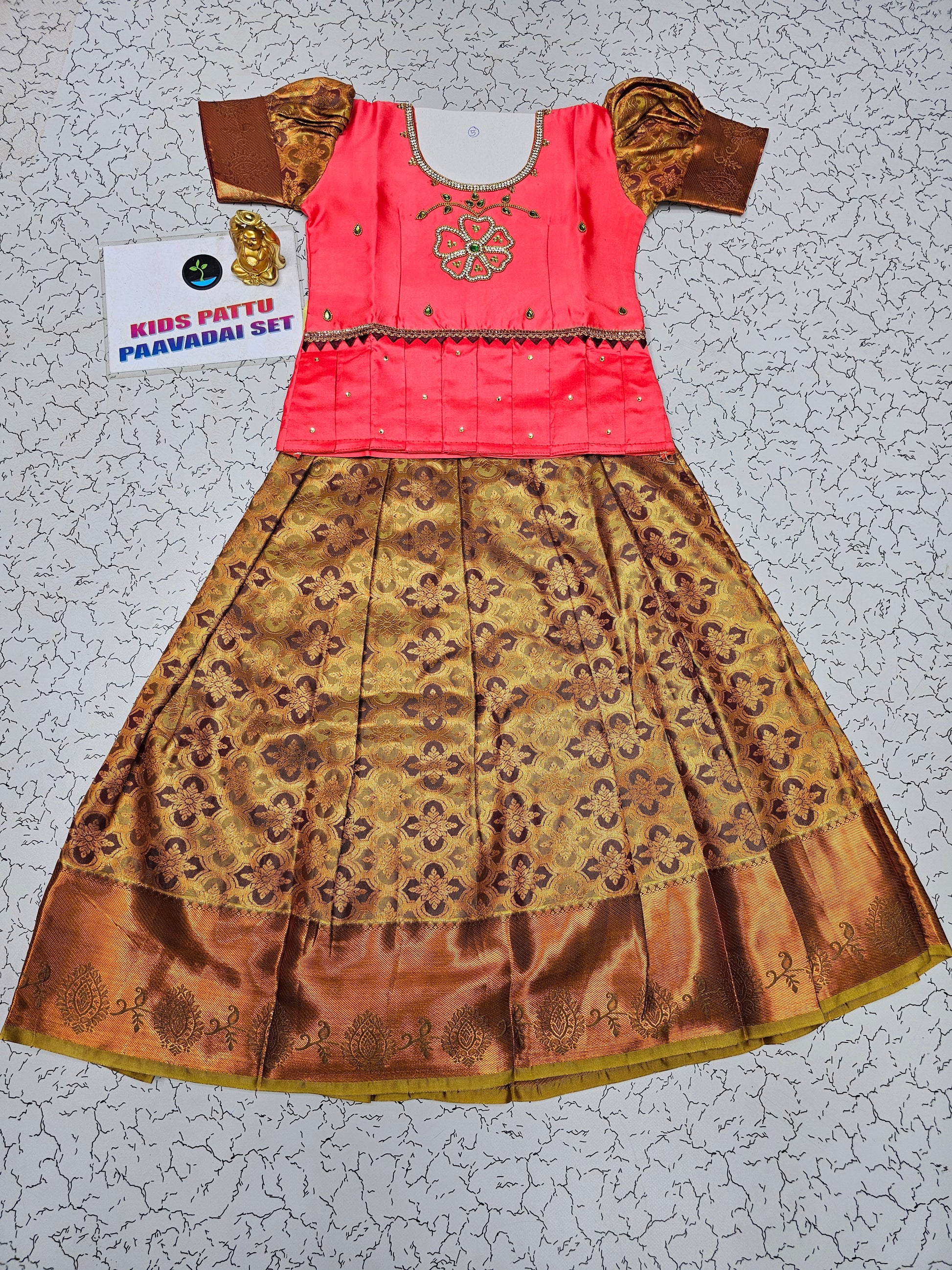 Peach pink and golden bridal silk pattu pavadai for kids with puff sleeves and stone embroidery – Sri Thulir Tex traditional South Indian festive dress