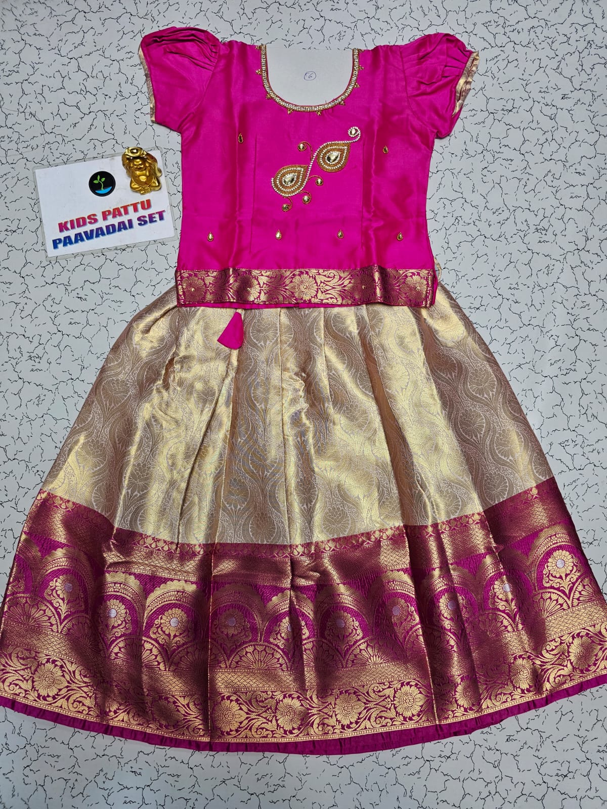 Pink and cream Banarasi semi silk pattu pavadai for girls with puff sleeve and golden zari border – Sri Thulir Tex