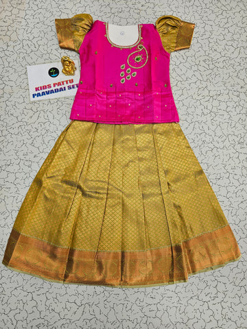 Pink and gold bridal silk pattu pavadai for kids with puff sleeves and green stone embroidery – Sri Thulir Tex South Indian traditional kids wear
