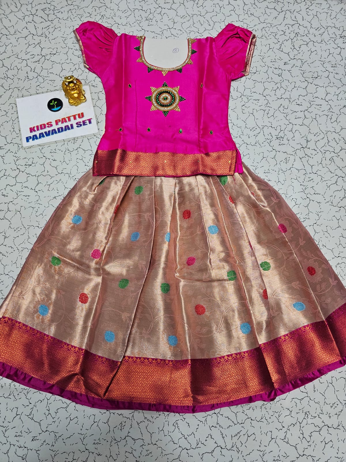 Pink and golden Banarasi semi silk pattu pavadai for girls with puff sleeve and zari border – Sri Thulir Tex