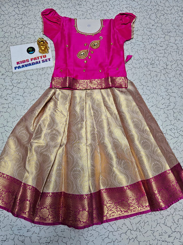 Pink and golden Banarasi semi silk pattu pavadai for girls with puff sleeve and zari border – Sri Thulir Tex